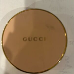 Gucci powder gorgeous container. No pad included